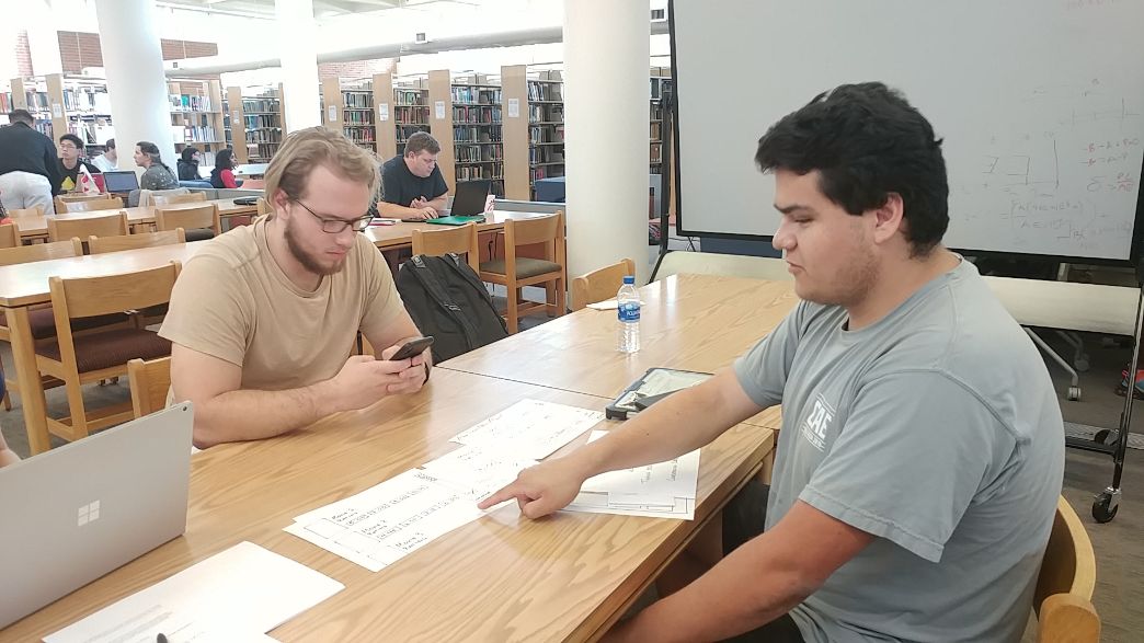 Me taking notes on my phone while our team tested a volunteer on the features of our paper prototype.